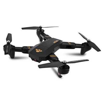 a black and yellow remote controlled flying device