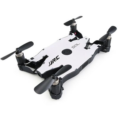 a white and black remote controlled flying device