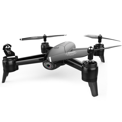 a black and white photo of a remote controlled flying device
